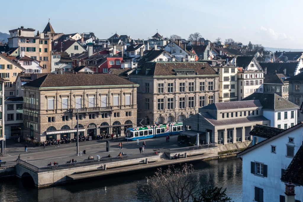 A view of the tram in Zurich in among the historic buildings.